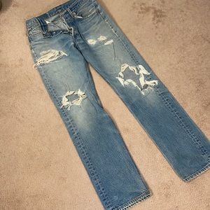 Vintage, perfectly worn button fly jeans